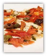 Filetti di platessa con pomodorini e olive taggiasche